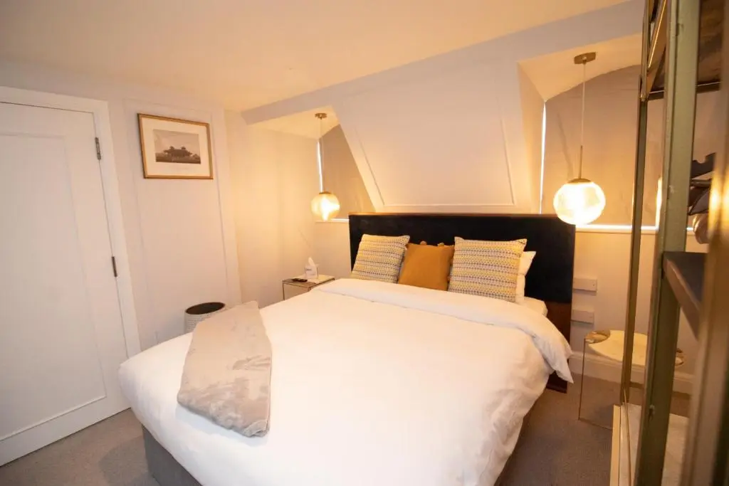 Chic urban hotel room featuring modern amenities